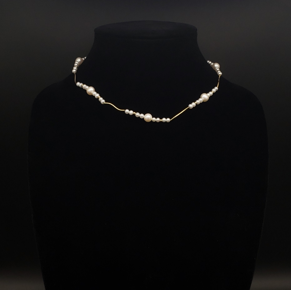 Genuine cultured pearl/14 kt gold station Necklace